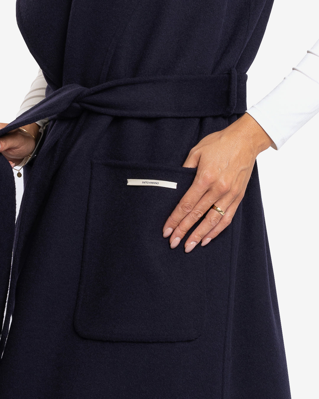 Sleeveless blue wool and cashmere coat